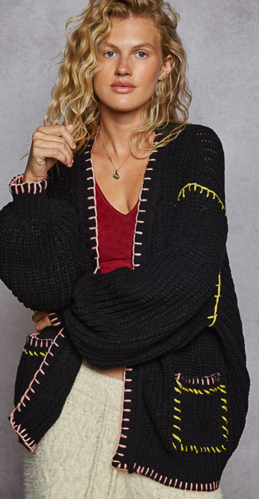 Black sweater knit open cardigan with neon pink and yellow stitching