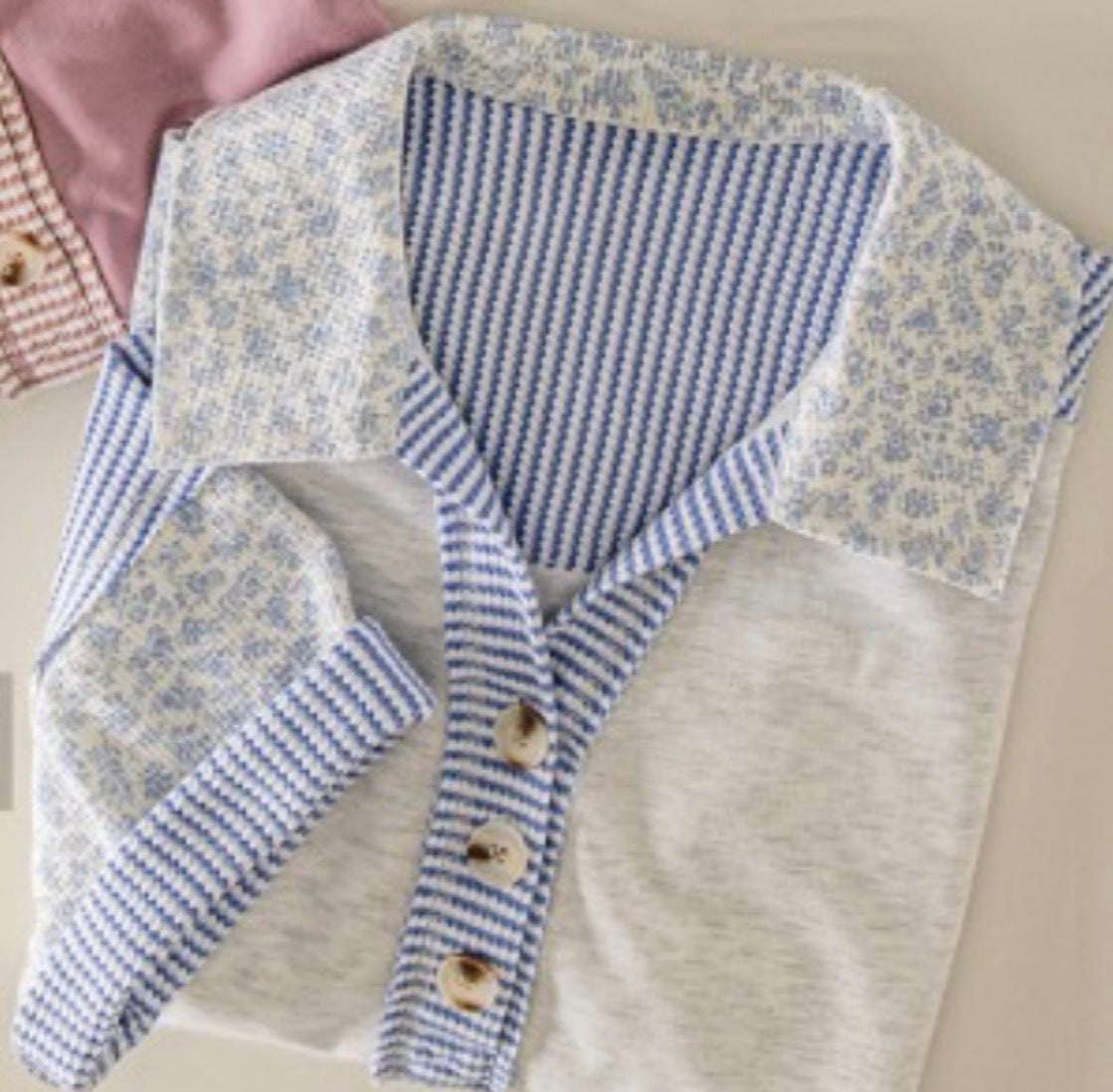 Grey collared top with blue stripes and flowers
