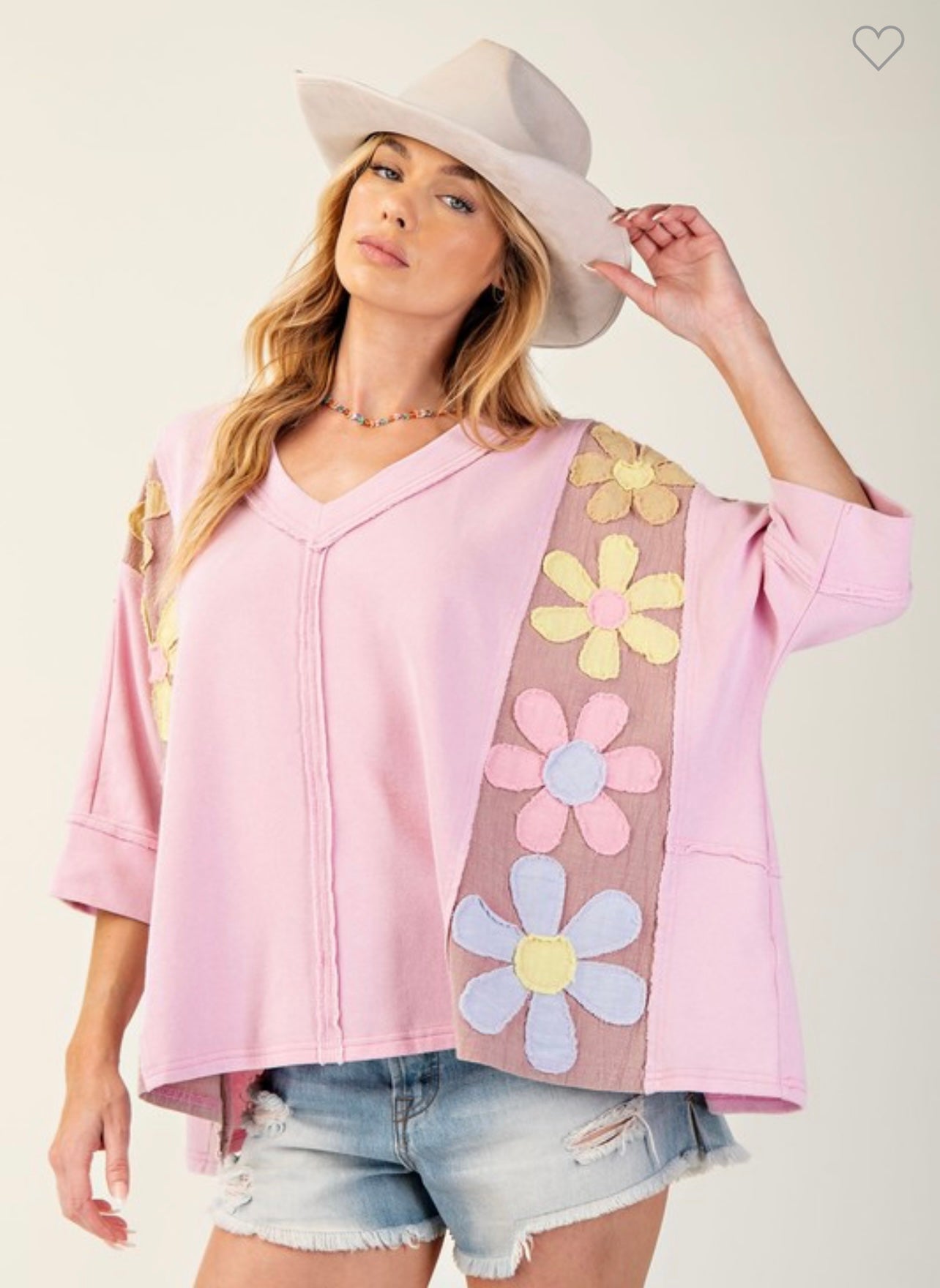 Pink loose fit top with daisy patches