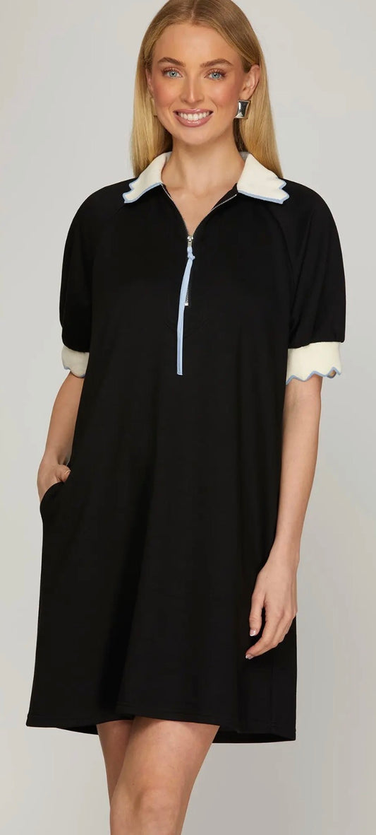 Black with blue zip front dress with white sleeve trim