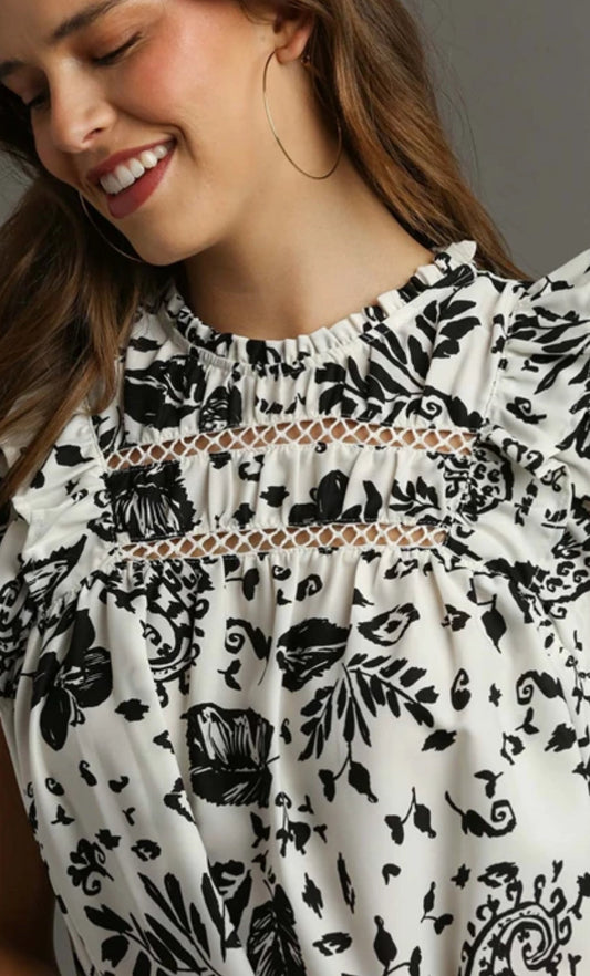 Black/white print tank with chest cutouts and flounce sleeves