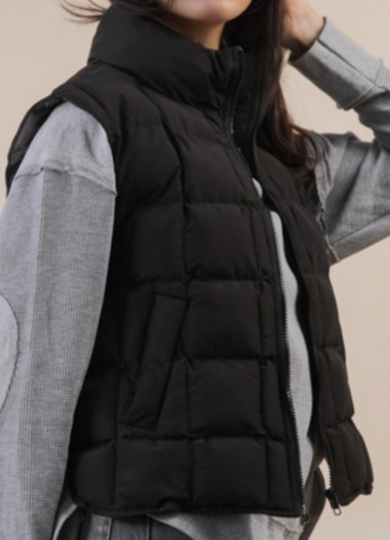 Black zip front puffer vest