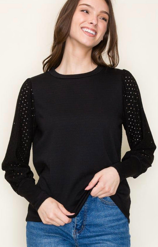 Black knit top with eyelet sleeves