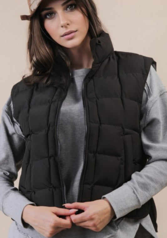 Black zip front puffer vest
