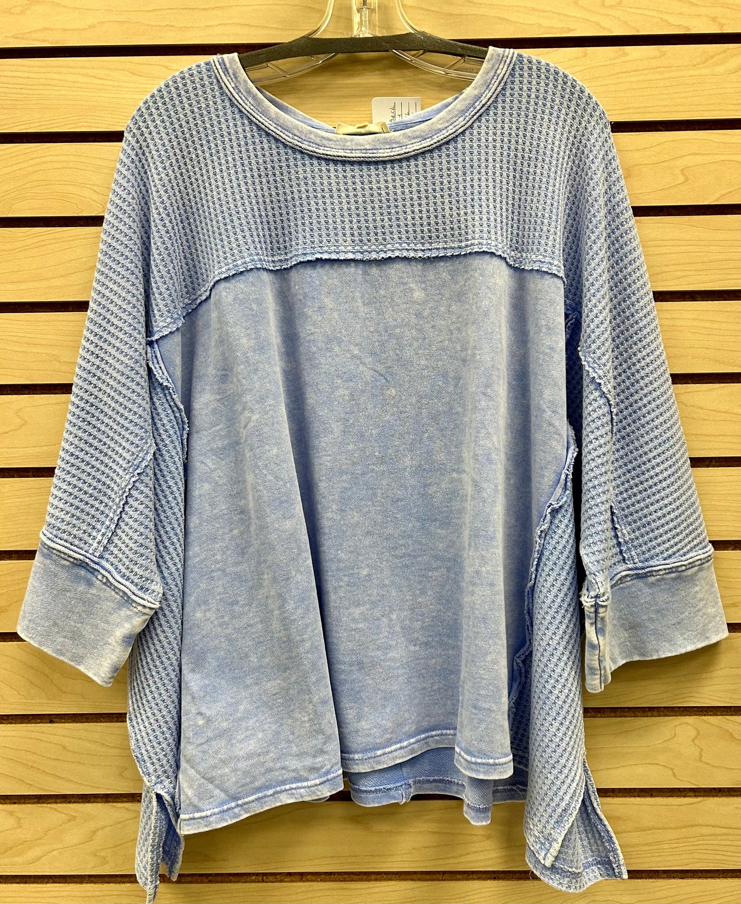 Blue loose fit soft ribbed top with tonal heart patch on back