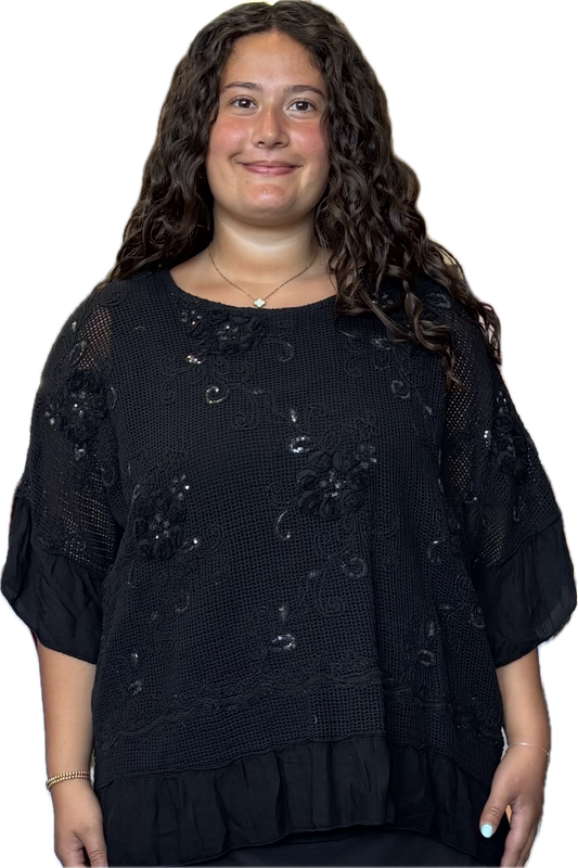 Black loose fit top with netting and tonal black sequin flowers and flounce bottom