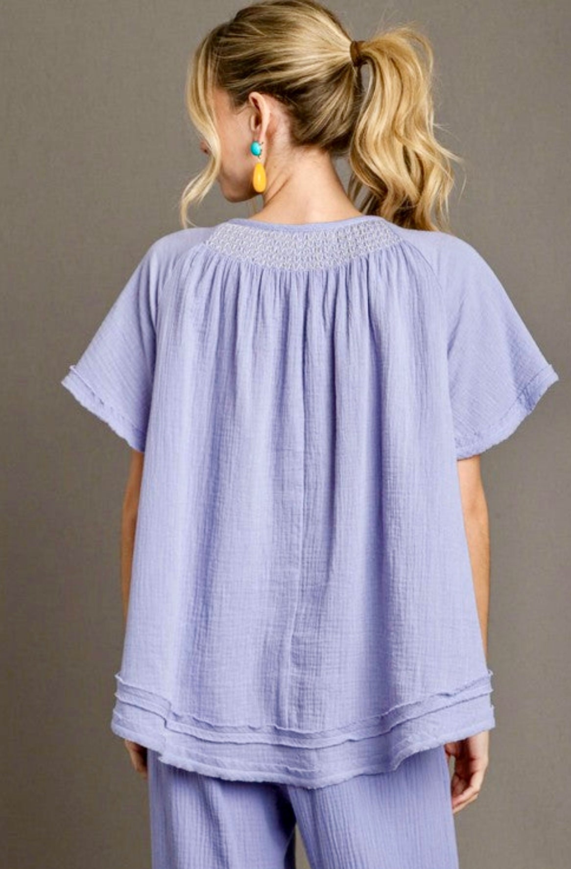 Purple gauze top with daisies and smocked detail