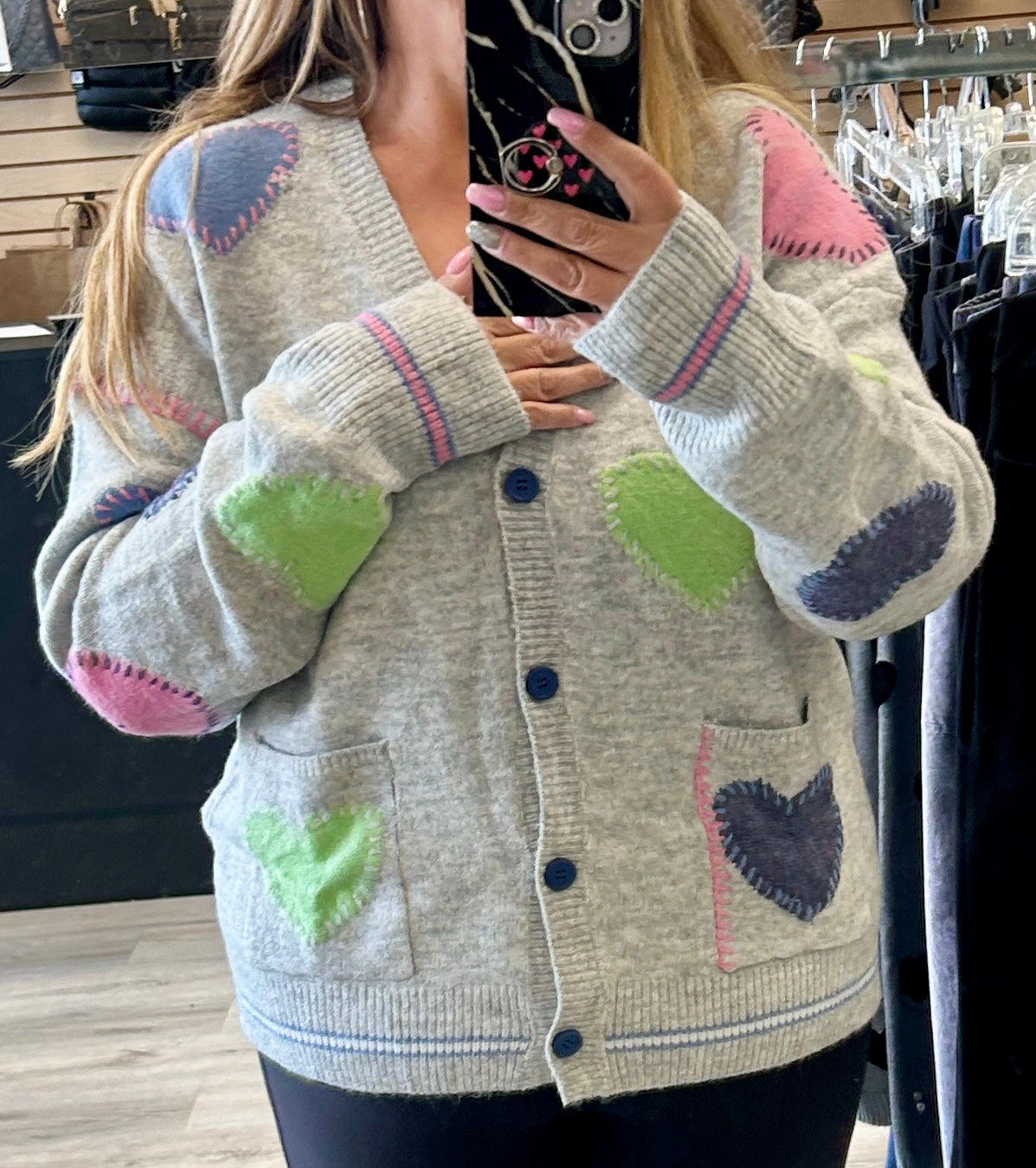 Grey sweater knit cardigan with multi heart patches
