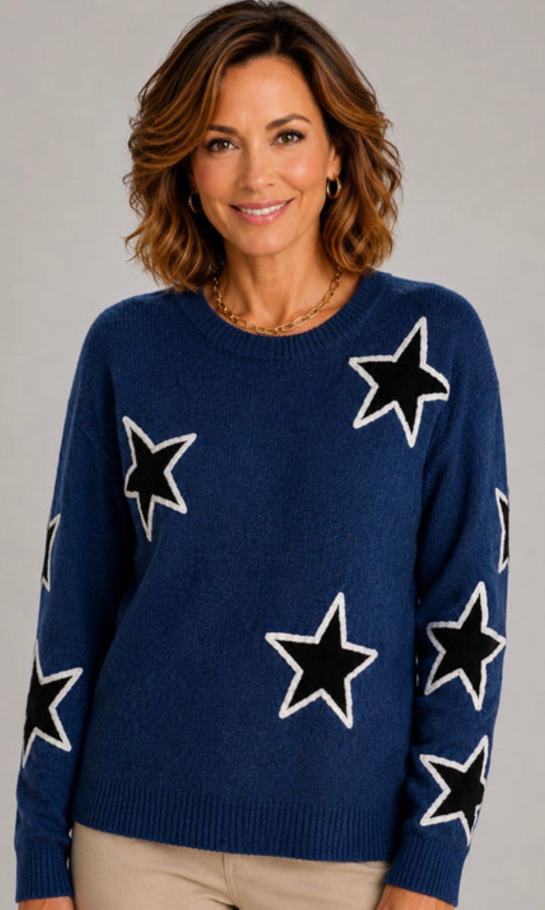 Navy sweater with black and white stars