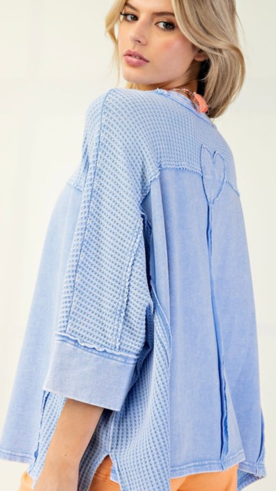 Blue loose fit soft ribbed top with tonal heart patch on back