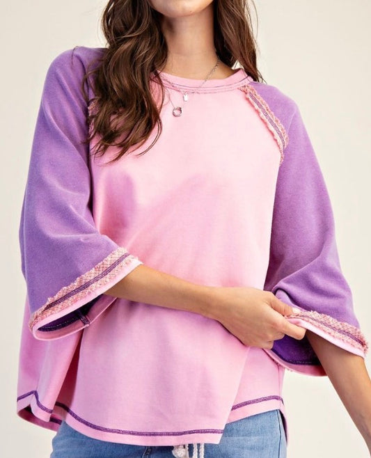 Runs generous…Pink loose fit raglan top with lilac sleeves