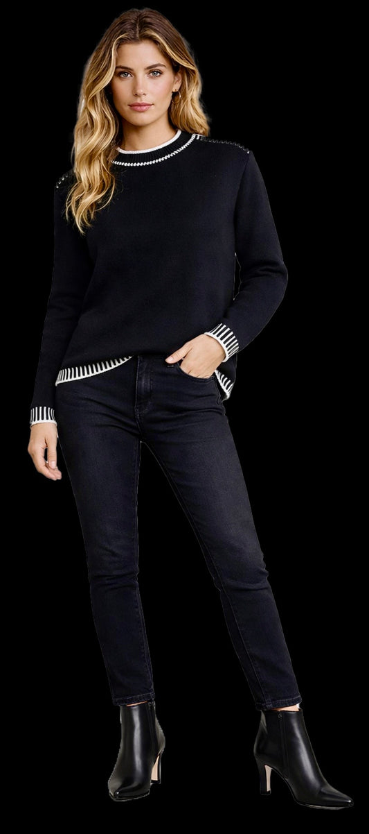 Black soft knit sweater with white stitching