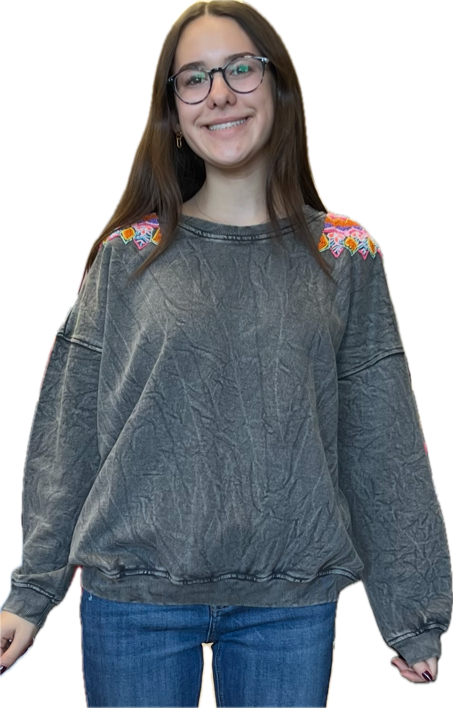 Assorted lightweight sweaters and sweatshirts with embellishments