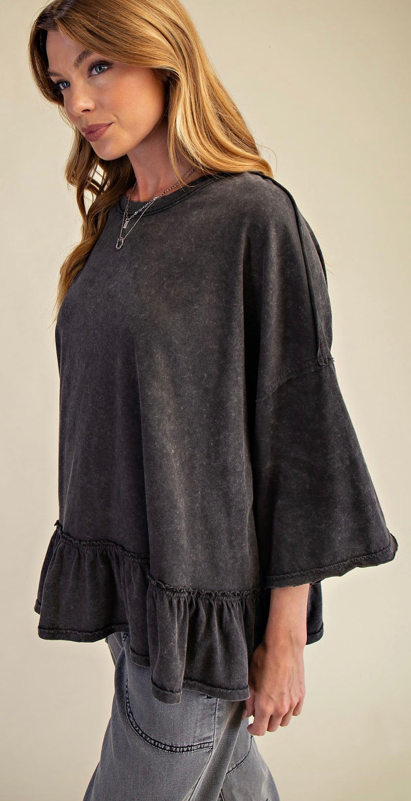 PREORDER NOW, Arriving Monday…Mineral wash black loose fit top with elbow length sleeves and flounce bottom