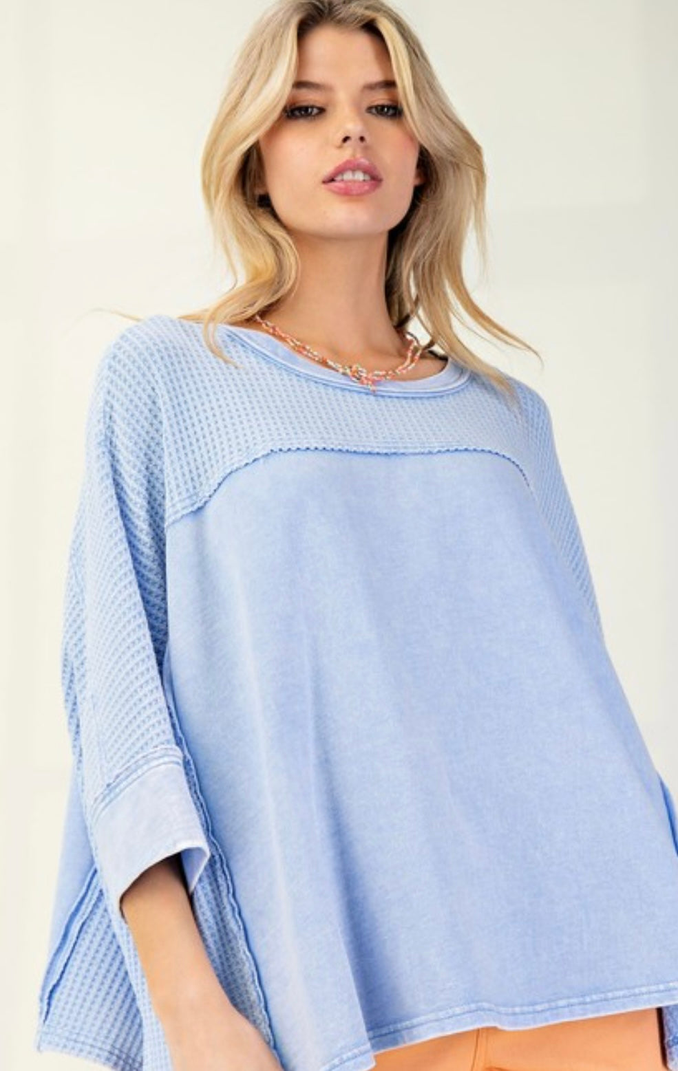 Blue loose fit soft ribbed top with tonal heart patch on back