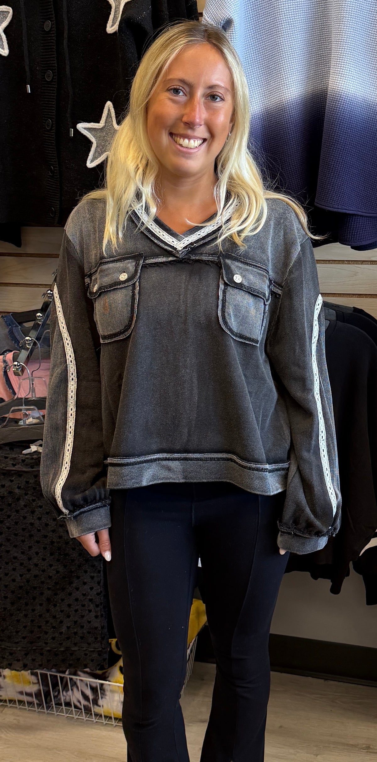 Black spray wash loose fit sweatshirt with pockets and white crochet trim