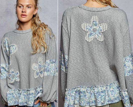 Grey flounce soft knit top with floral daisy patches