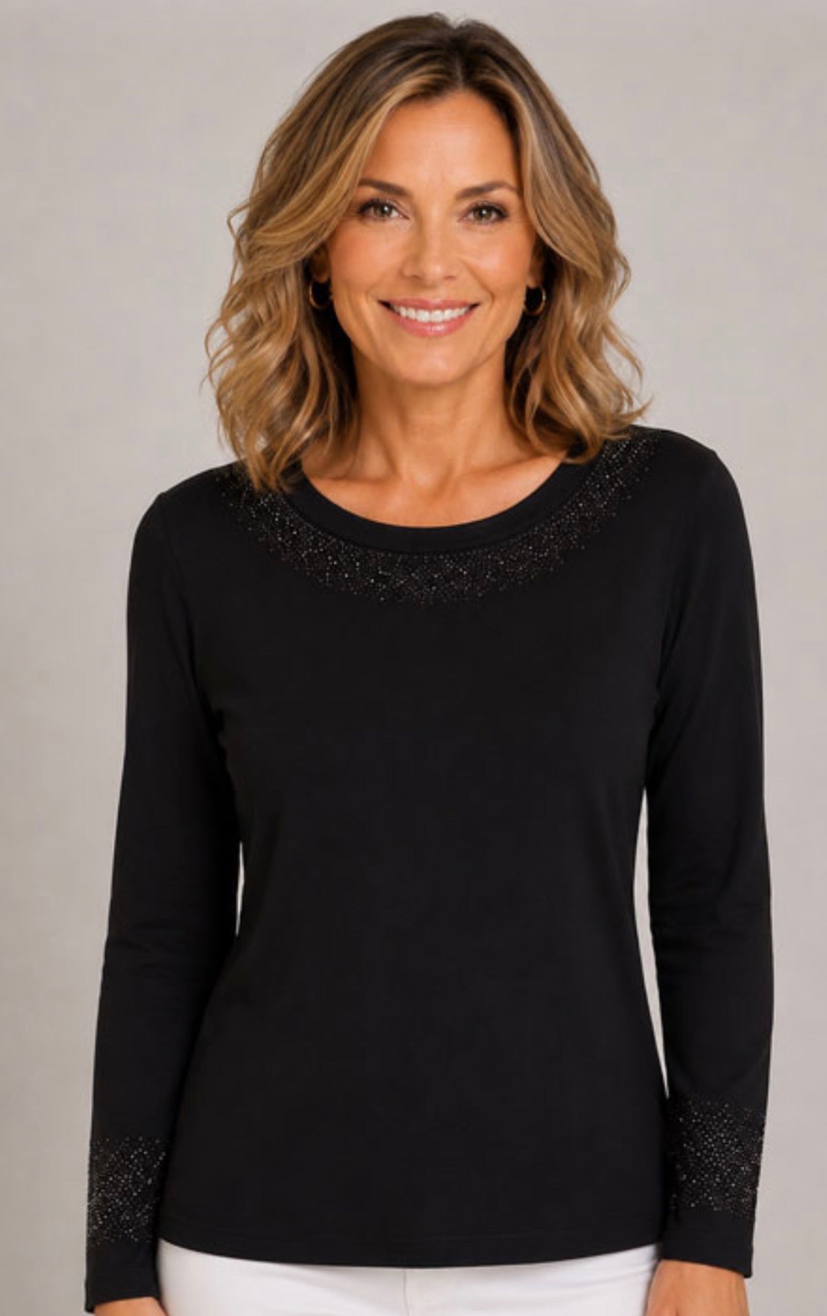 Black jersey knit top with black crystals at neck and sleeves, wear alone or also great layered under a vest, available up to XXL