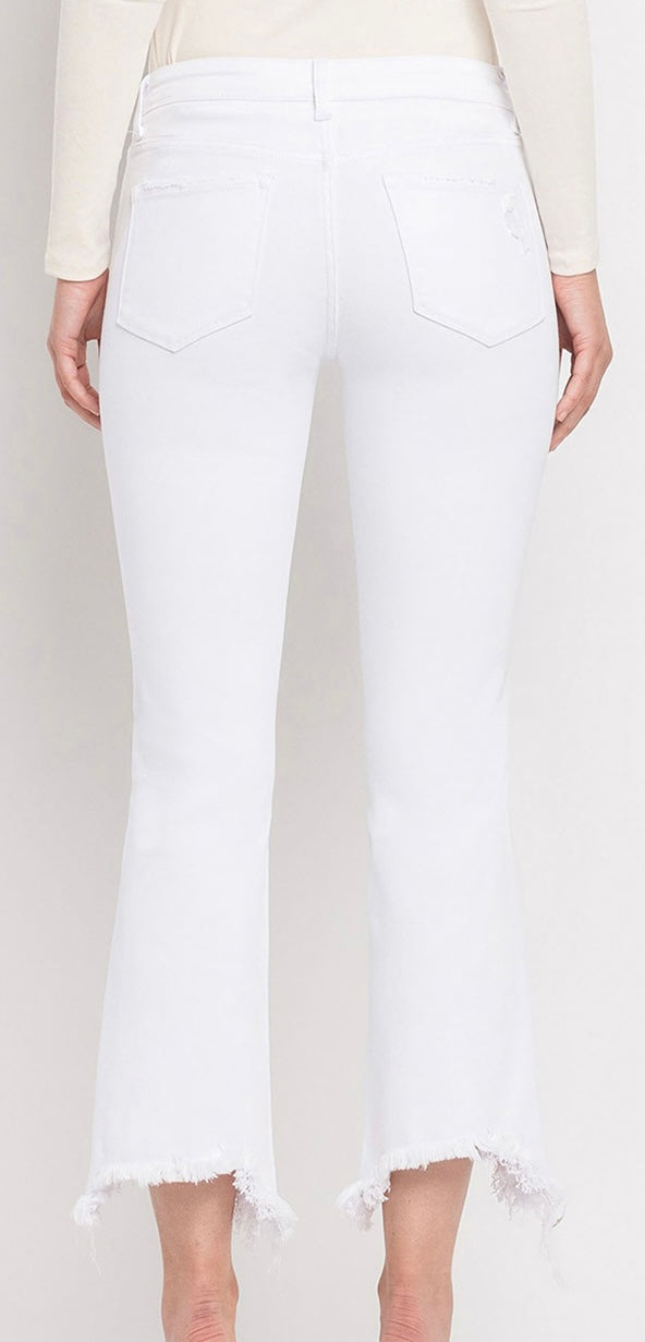 Mid rise white stretch crop fray bottom jeans