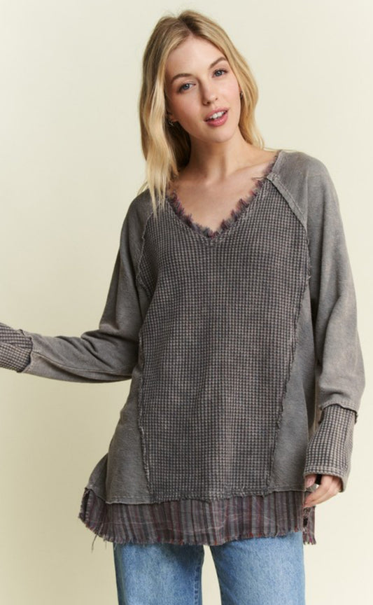 Grey loose fit waffle mix top with plaid inserts and fray detail