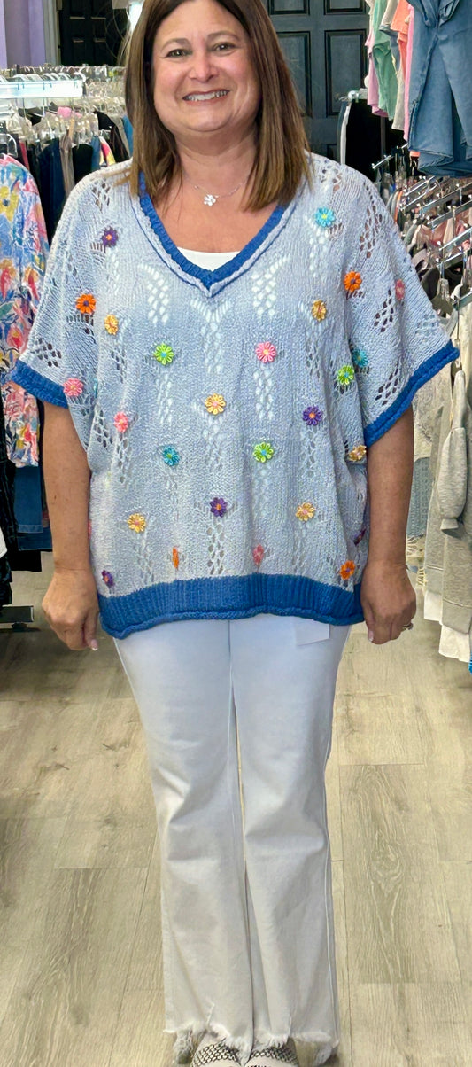 Crochet loose fit top with blue trim and multi flowers, available up to 1X/2X