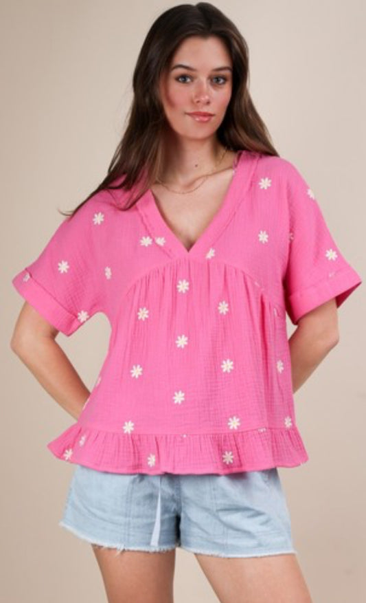 Pink flounce top with white daisies