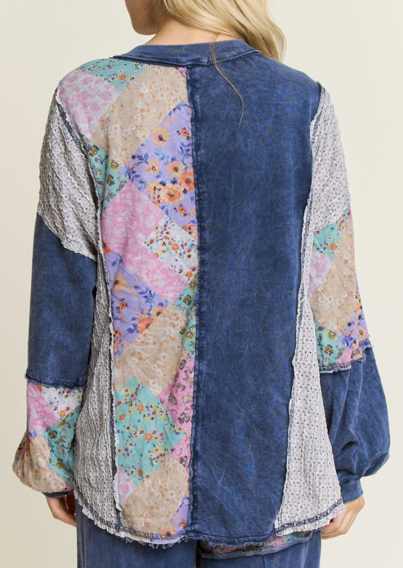 Navy top with floral and crochet inserts