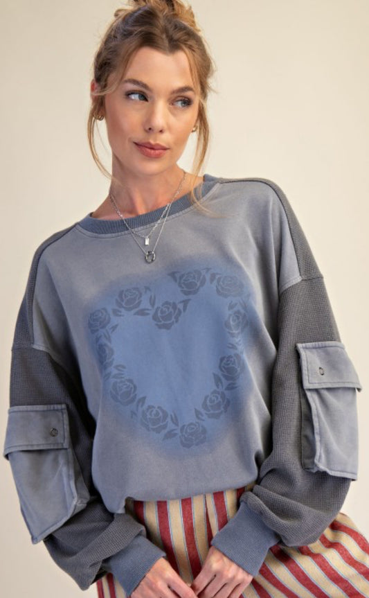 Blue loose fit top with roses heart and cargo pockets on sleeves