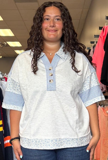 Grey collared top with blue stripes and flowers