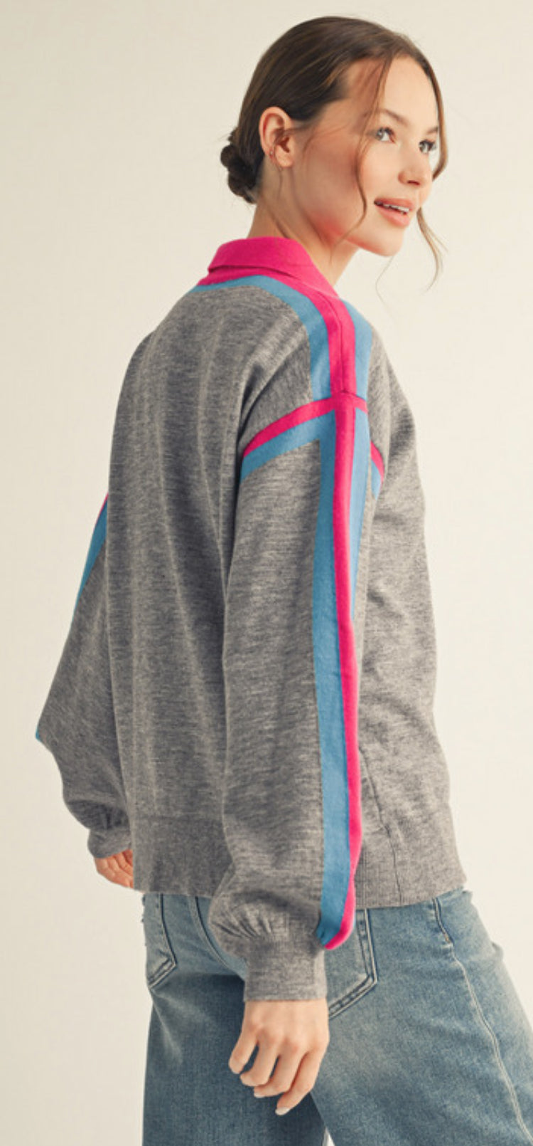 Grey top with hot pink and blue stripes and collar