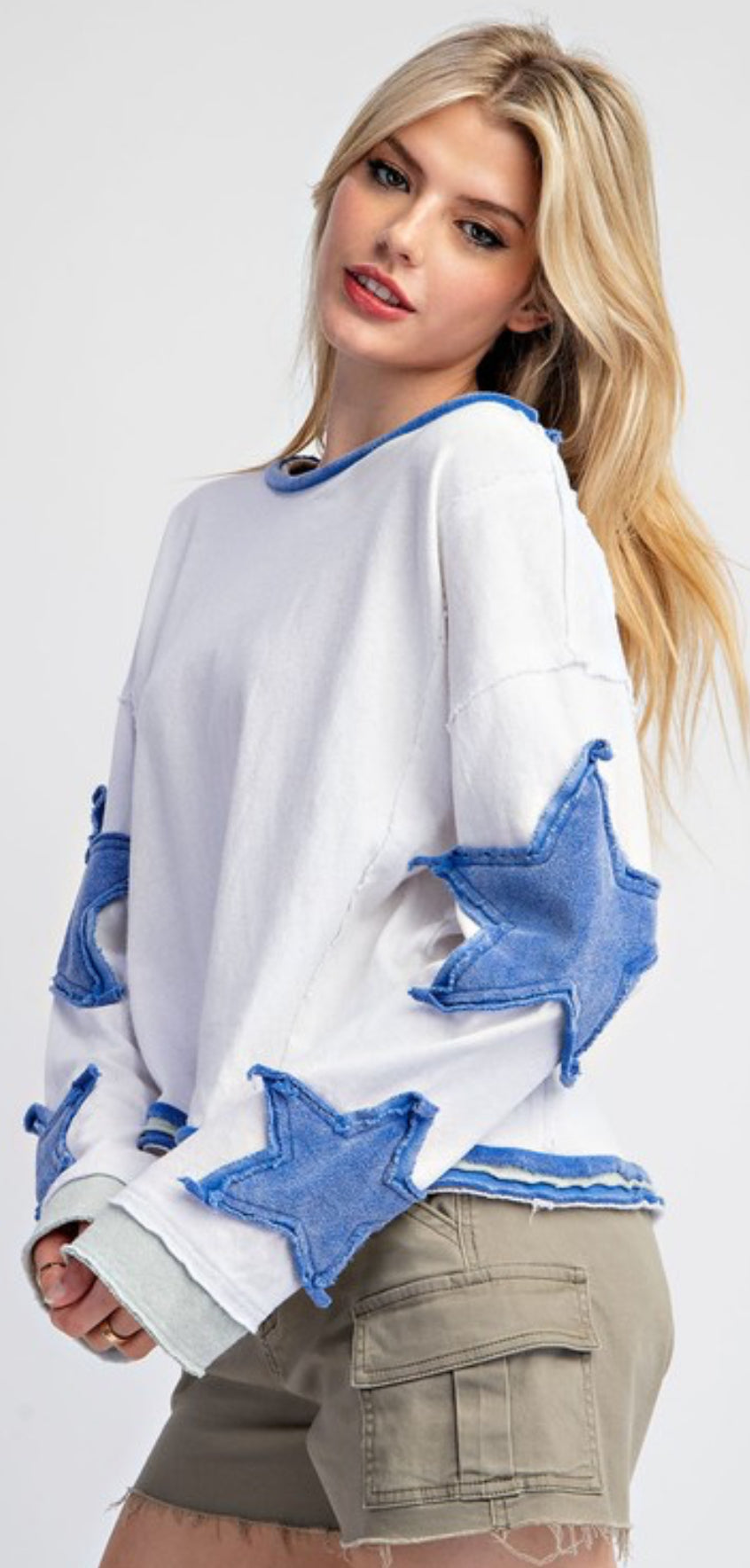 White sweatshirt with denim star applique sleeves