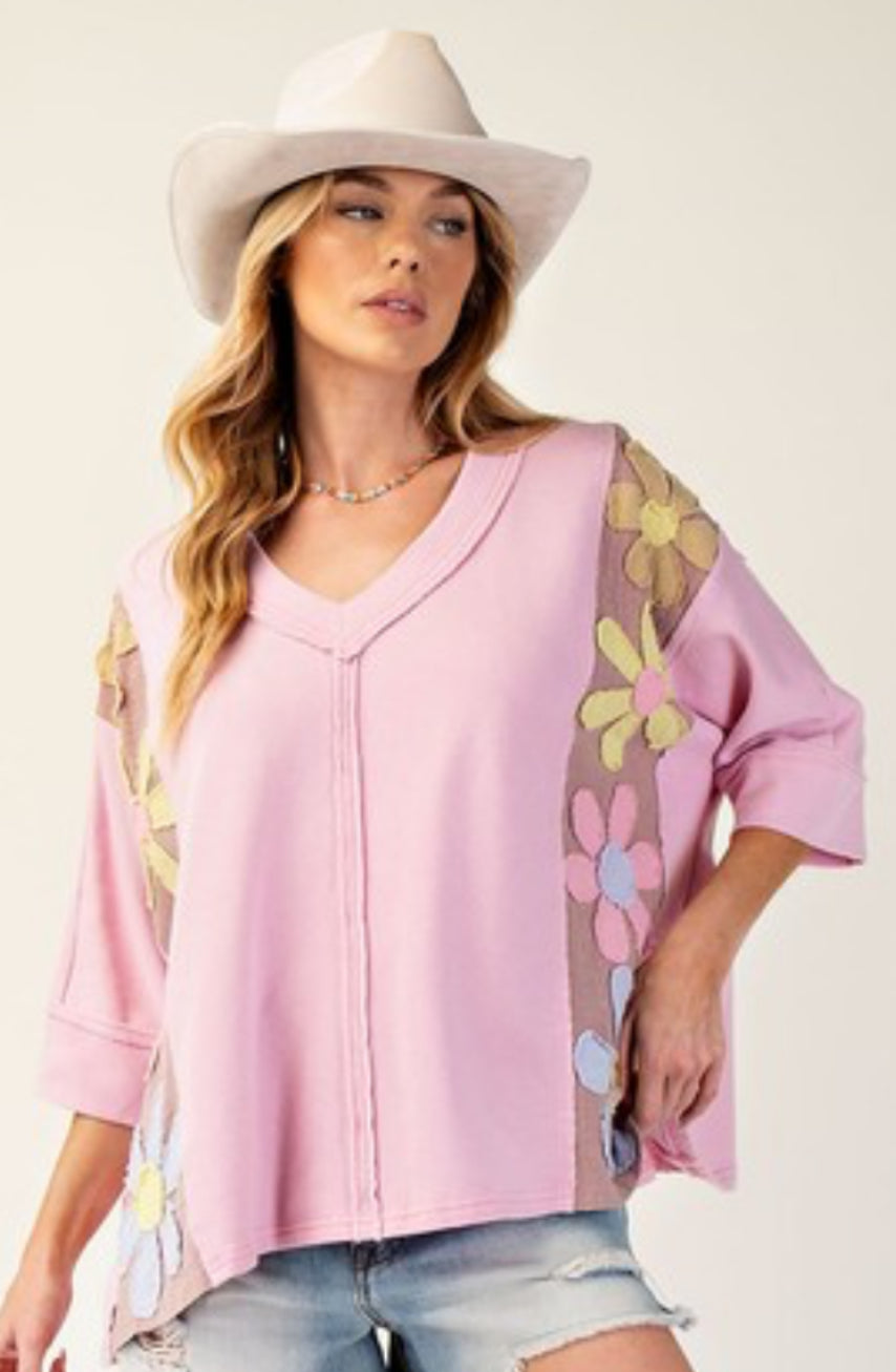 Pink loose fit top with daisy patches