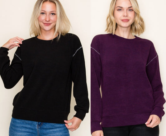 Black or Plum textured sweater knit top with sleeve stitching
