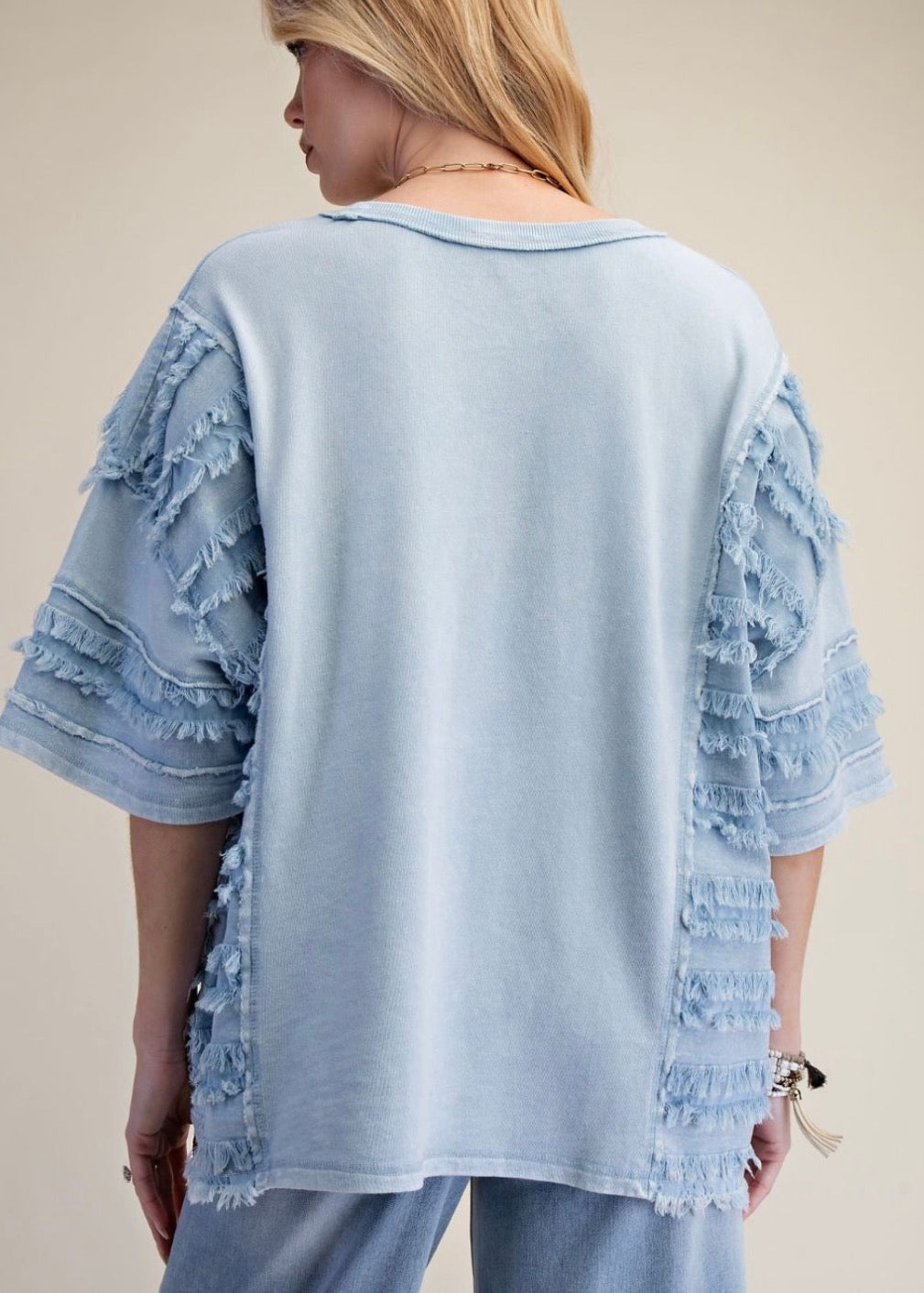 Blue loose fit top with fray detail