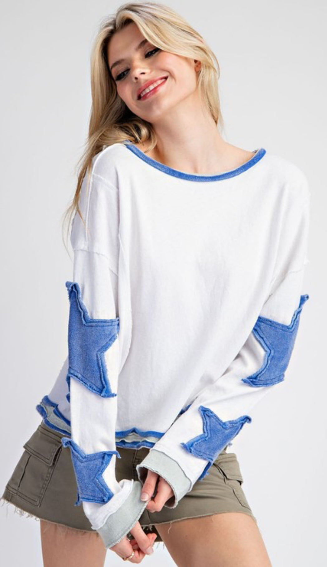 White sweatshirt with denim star applique sleeves