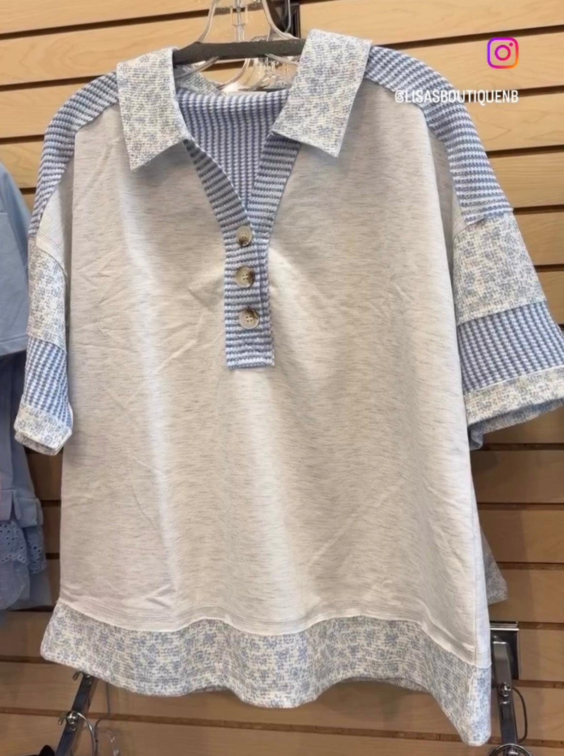 Grey collared top with blue stripes and flowers