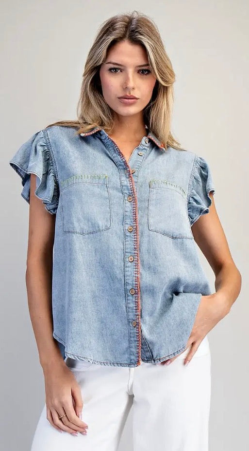 Lightweight denim ruffle shoulder blouse with multicolored stitching