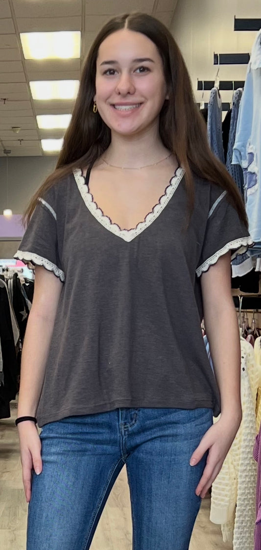 Grey v neck with white scallop trim
