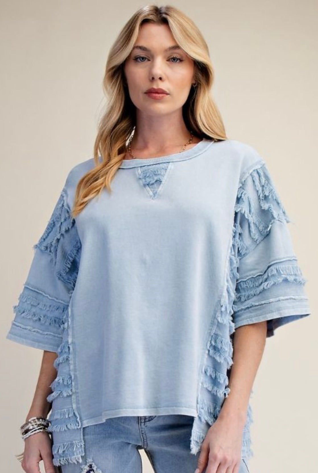 Blue loose fit top with fray detail