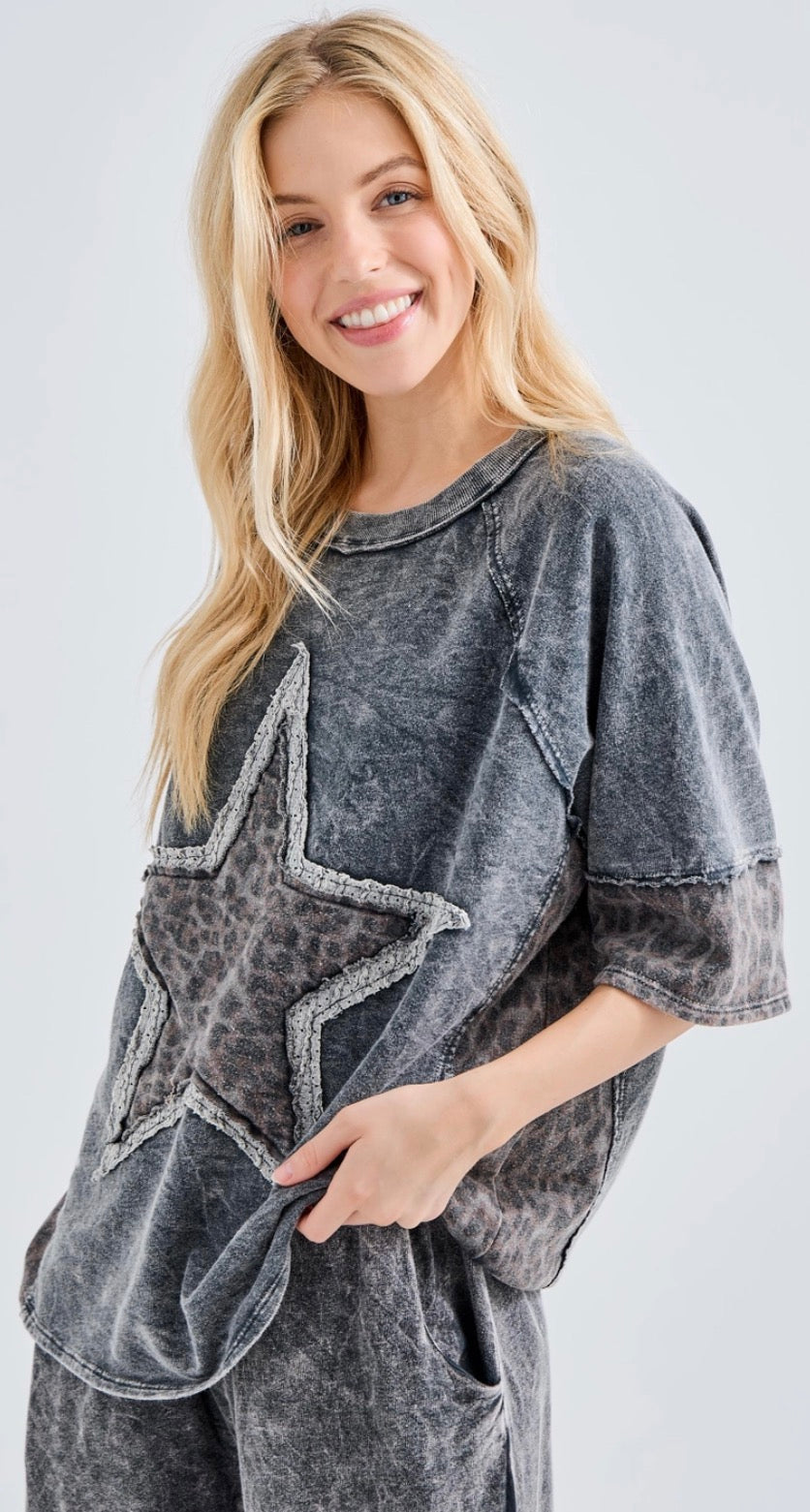 Mineral wash black top with leopard star and sleeve trim