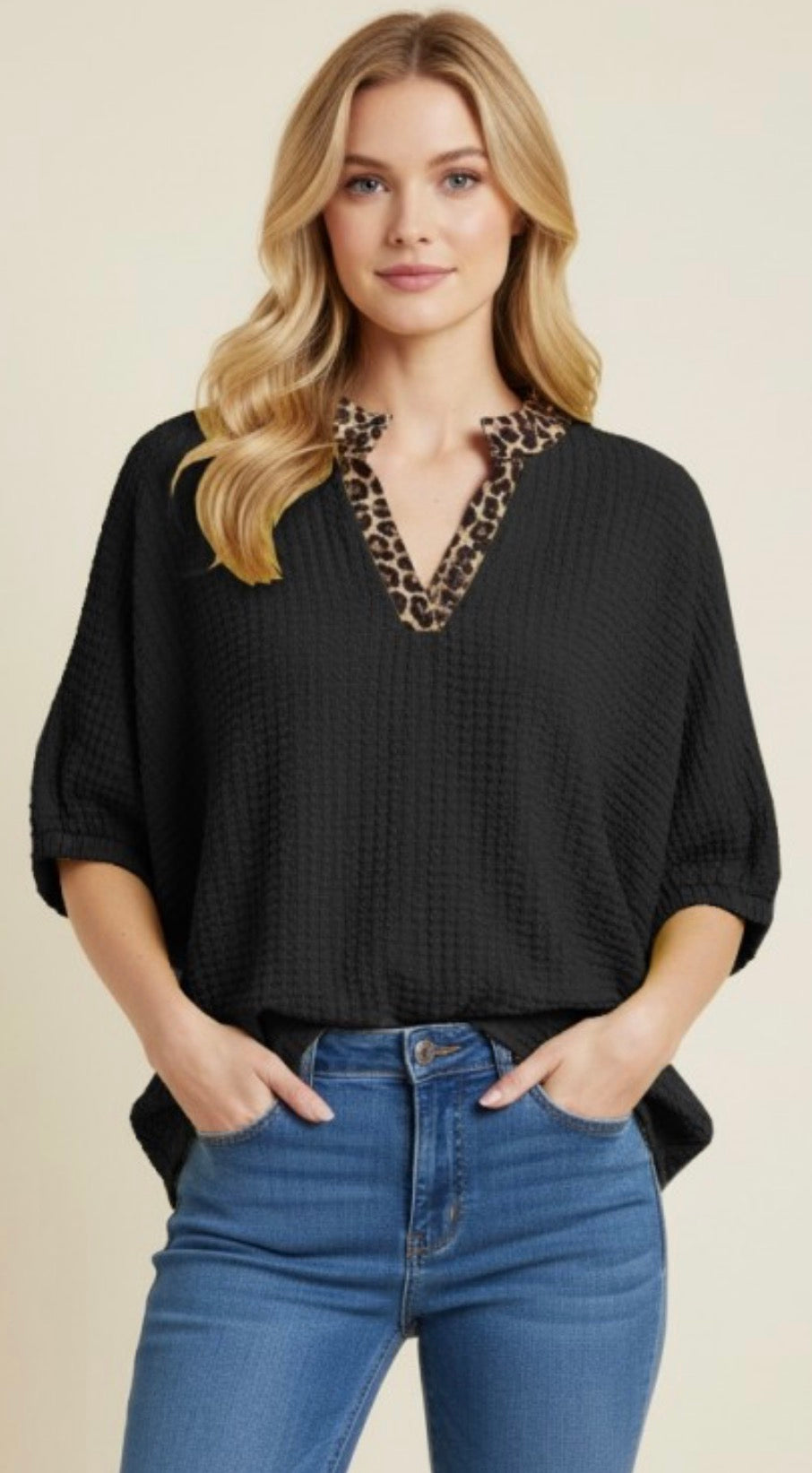 Loose fit black elbow sleeve boxy top with leopard trim at v