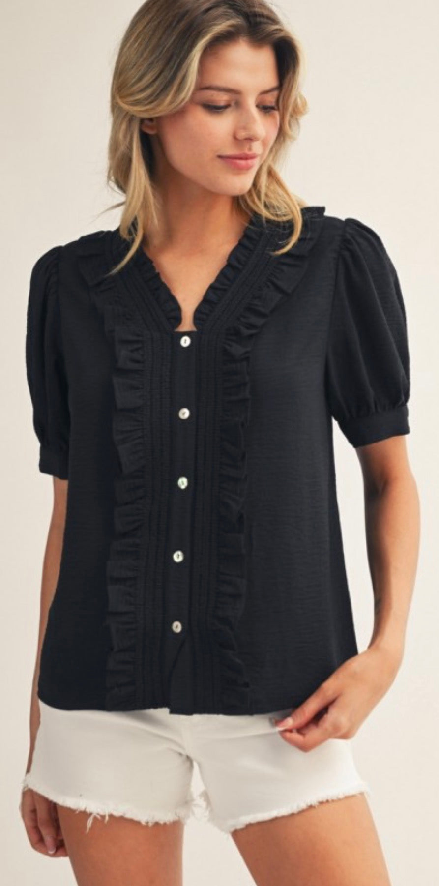 Black soft, lightweight button down top with ruffle detail