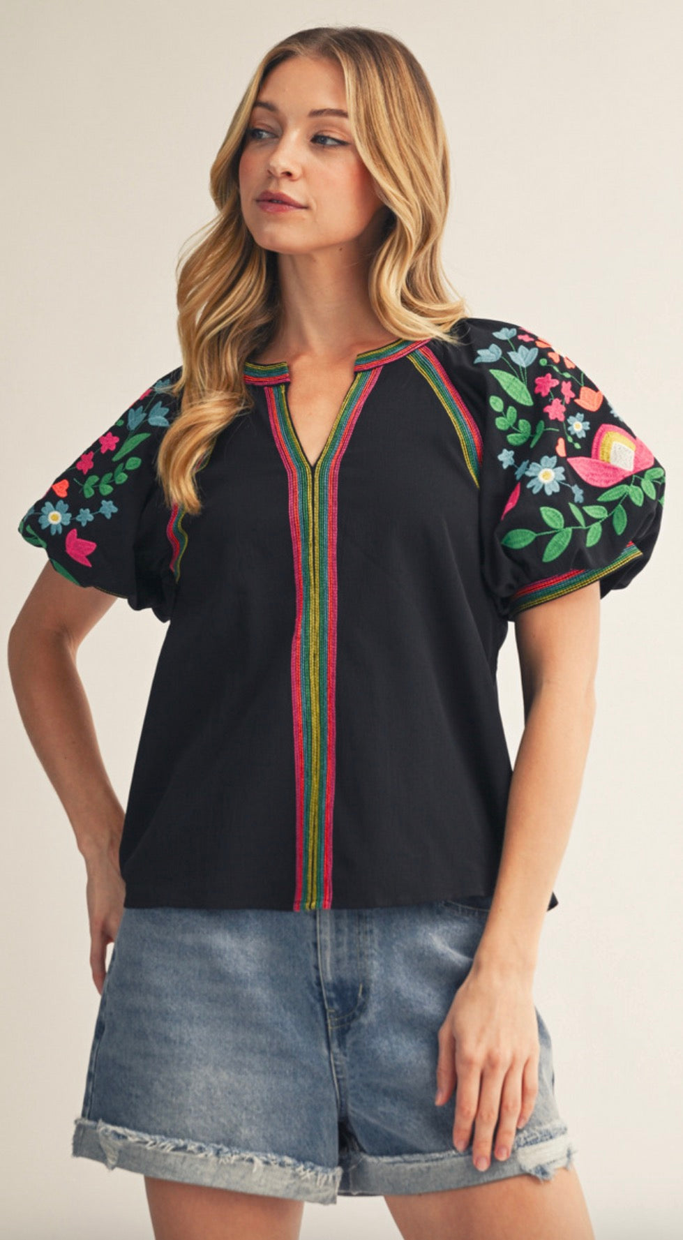 Black puff sleeve top with floral embroidery
