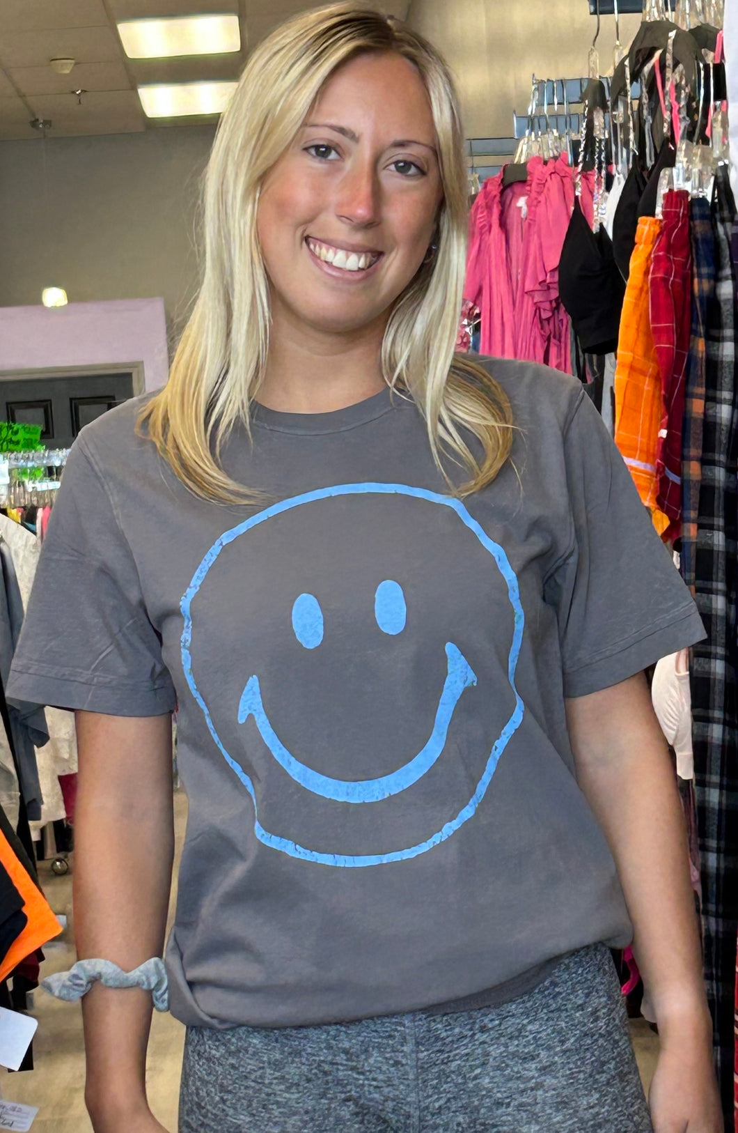 Grey tee with blue smiley face